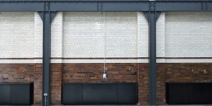 This image shows the refurbished steelwork and tiling of the photographic studio.