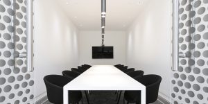 This image shows the interior of the showroom conference room of this Danish fashion design company.