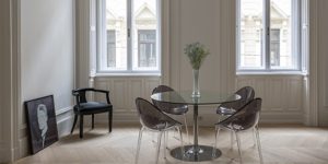 This image shows the dining room in the historic renovated Budapest apartment, Hungary