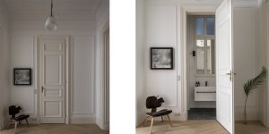 This image shows the hallway and the guest bathroom in the historic renovated Budapest apartment, Hungary