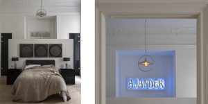 This image shows the Master Bedroom and detail of neon art in the historic renovated Budapest apartment, Hungary