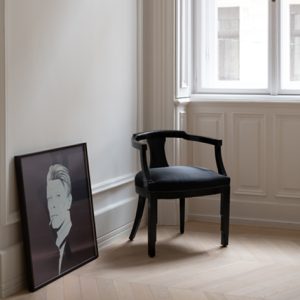 This image shows the dining room in the reimagined historic Budapest apartment