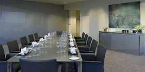 This image shows the dining area for this confidential media company's meeting and entertainment suite.