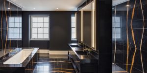 This image shows the master ensuite bathroom in this renovated historic townhouse in London.