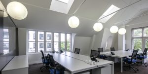 This image shows the top floor open plan offices of this investment company.
