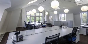 This image shows the open plan offices of this investment company.