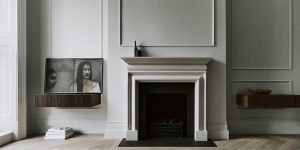 This image is of the Living Room on the 1st floor, showing the fireplace and storage units in this historic restoration of a London house.